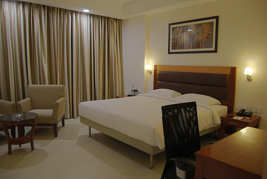 Poppys Anukula Residency Vellore Zimmer foto